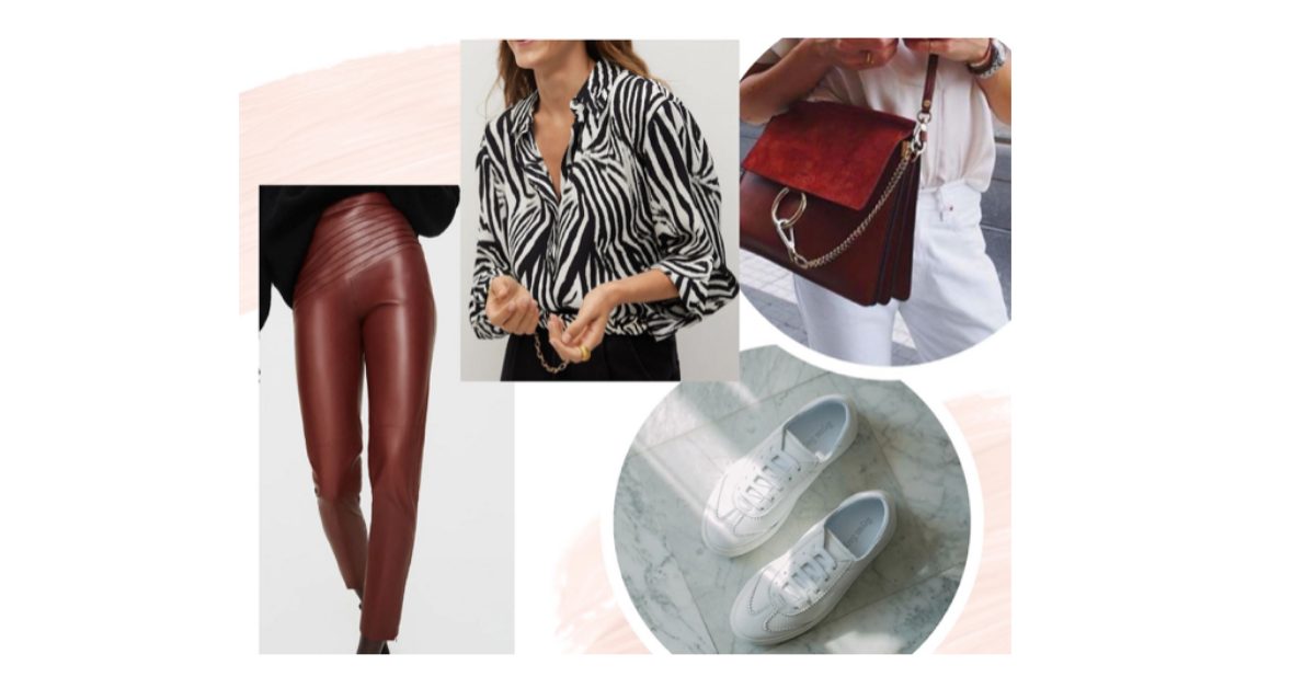 Oxblood faux-leather leggings with a zebra-print shirt, a red suede chain shoulder bag and white trainers
