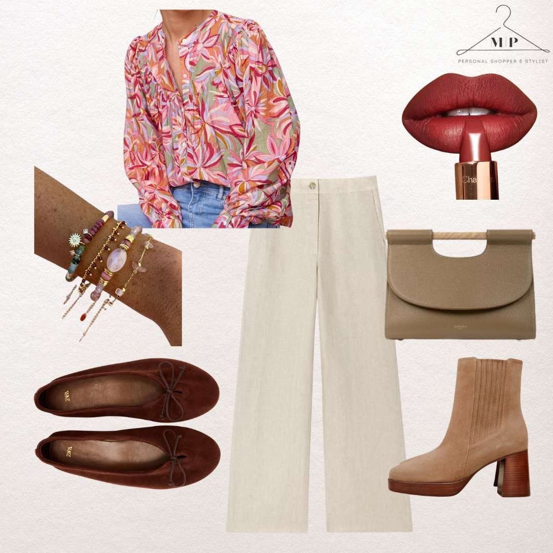 Pink and orange floral blouse with cream wide-leg trousers, stacked beaded bracelets, brown ballet flats, taupe ankle boots, a beige clutch and a red lipstick